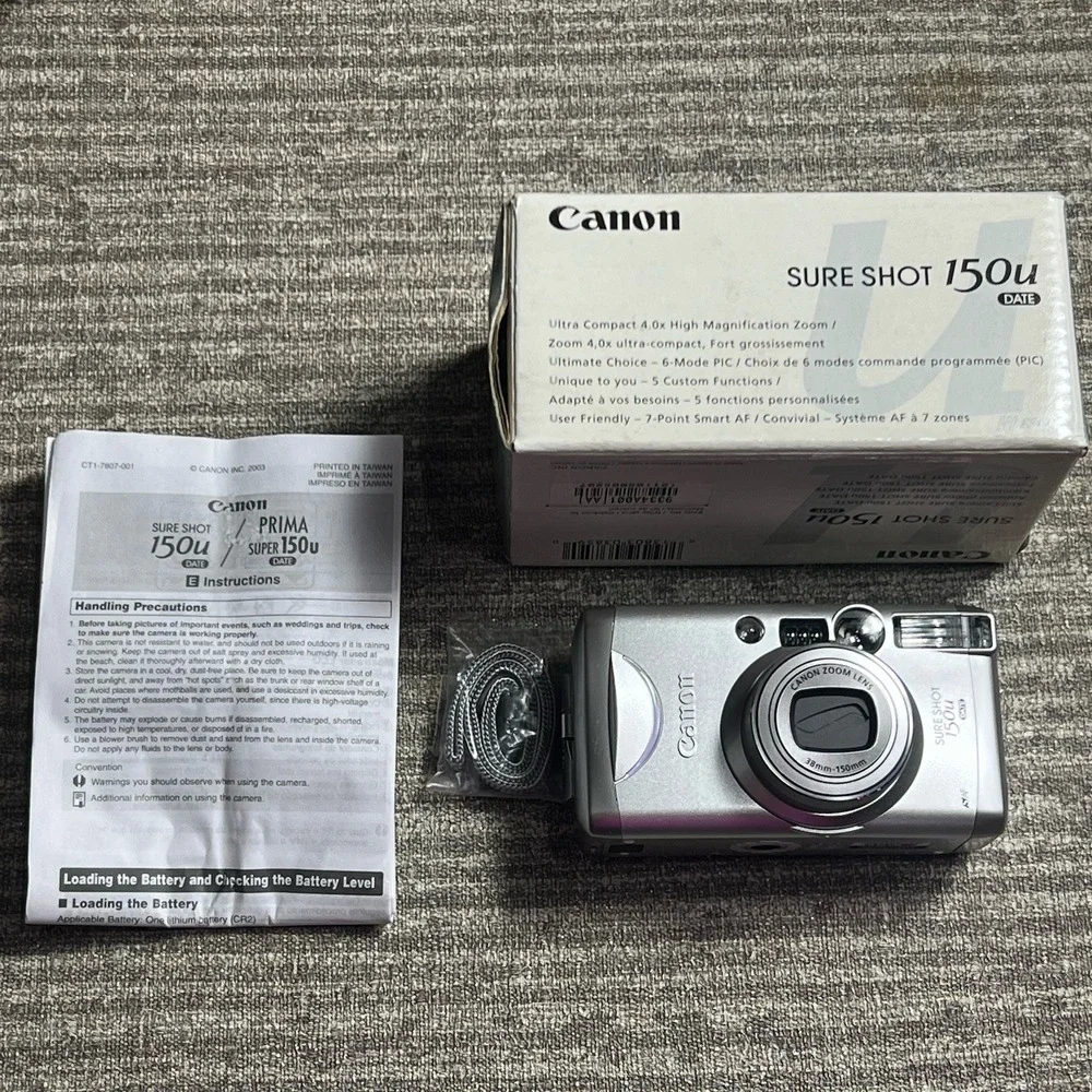 Vintage Canon Sure Shot 150u 35mm Film Camera 38-150mm Zoom Silver Box Manual